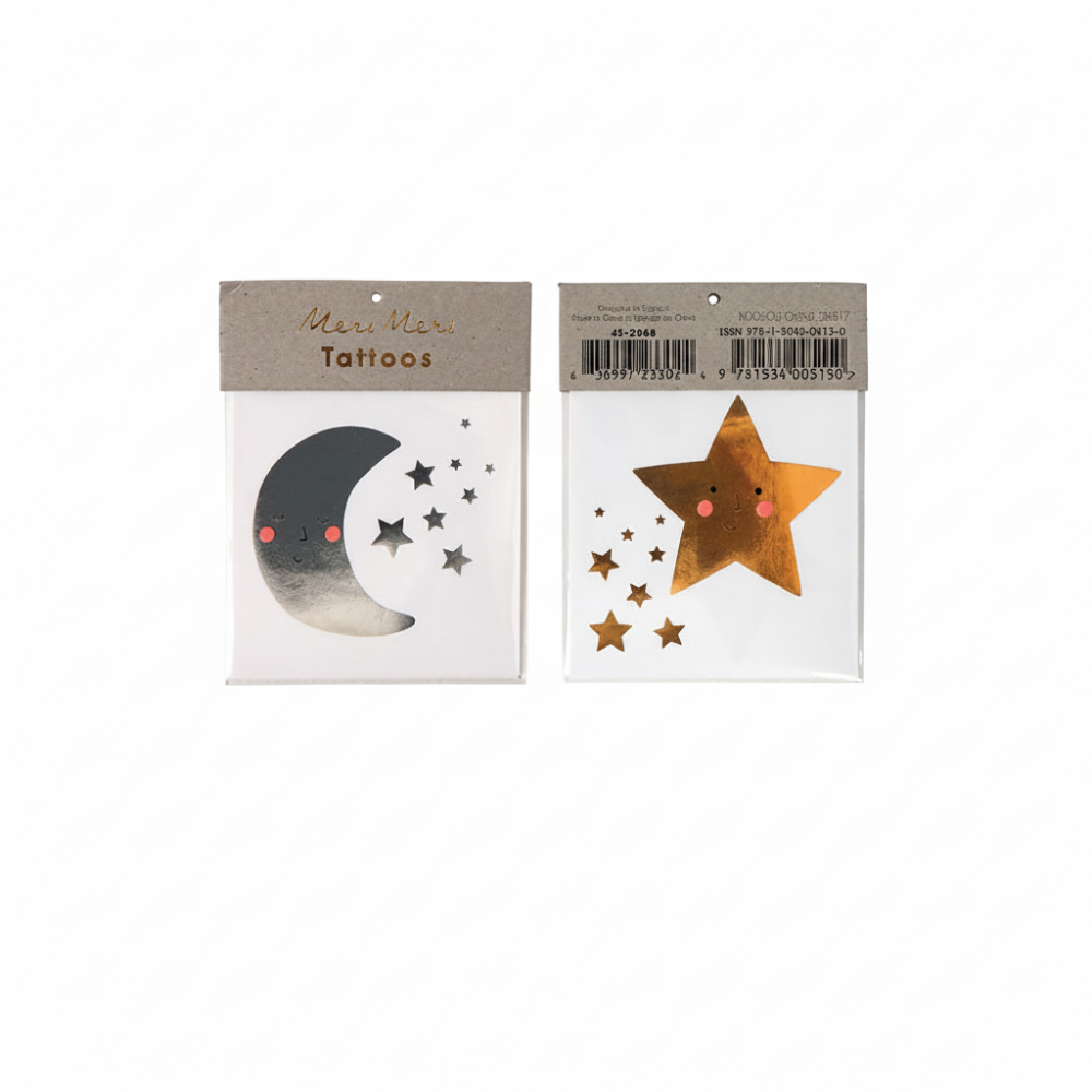 Two small packaged temporary tattoos on a white background. The left package shows a crescent moon and stars in dark gray and silver tones.
