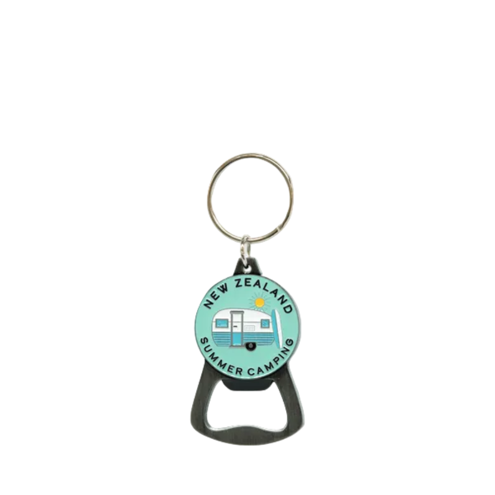 A bottle opener keychain with a circular light blue and white camping trailer graphic on a light gray background.