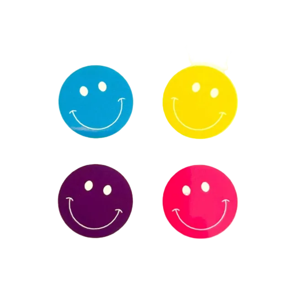 Four circular smiley face stickers arranged in a 2x2 grid on a white background, featuring blue, yellow, purple, and pink colors.