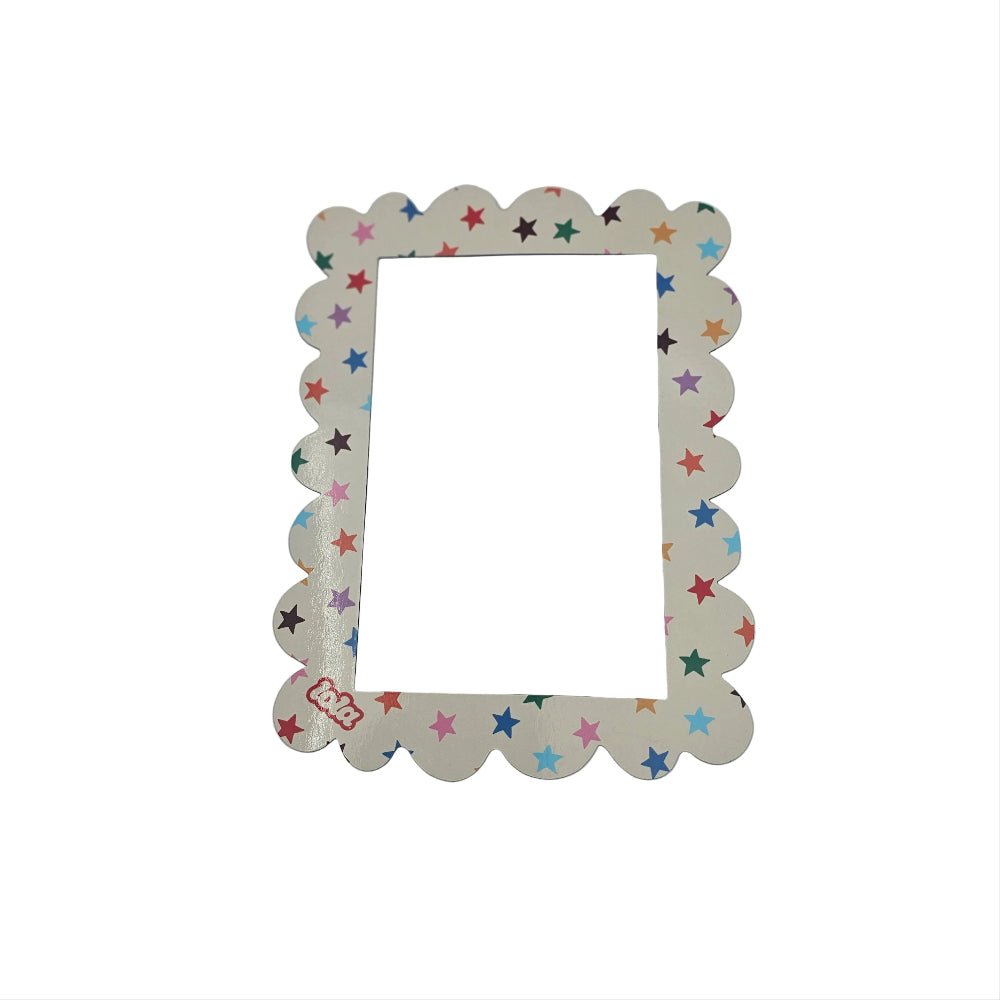 A scalloped rectangular picture frame with a colorful star pattern on a light beige background, shown on a plain white surface.