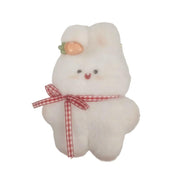 A white fluffy plush bunny accessory with a red and white gingham ribbon bow around its neck and a small peach-colored carrot accent on its head, shown against a plain light background.
