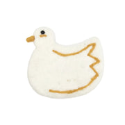 A hand-felted duck-shaped coasterin off-white wool with a brown beak, black eye, and brown wing outline, shown on a plain white background.