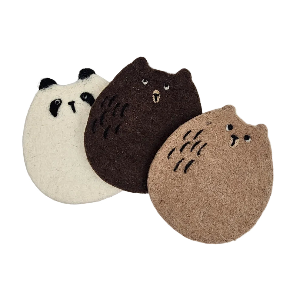 Three felt bear-shaped coasters in cream, dark brown, and tan, arranged on a plain white background.
