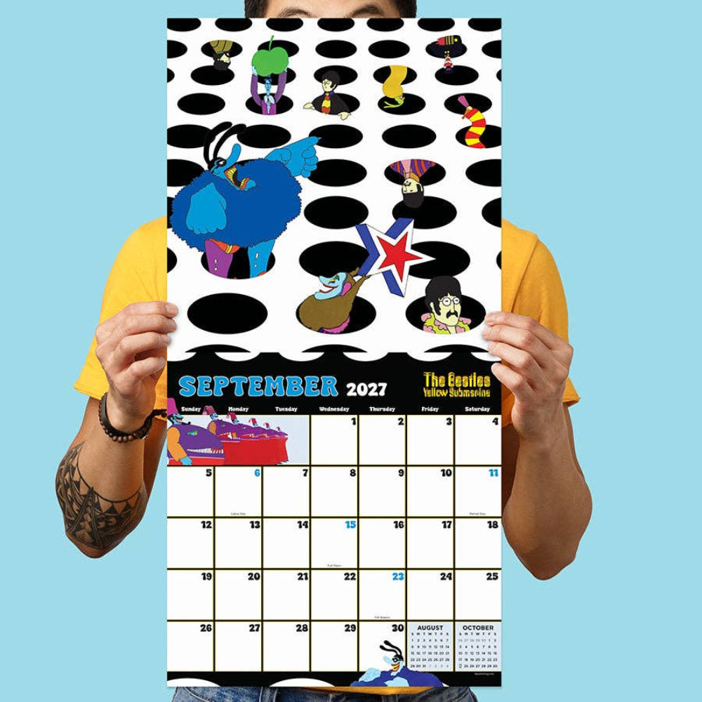 Person holding a calendar with colorful characters and September 2027 date on a blue background