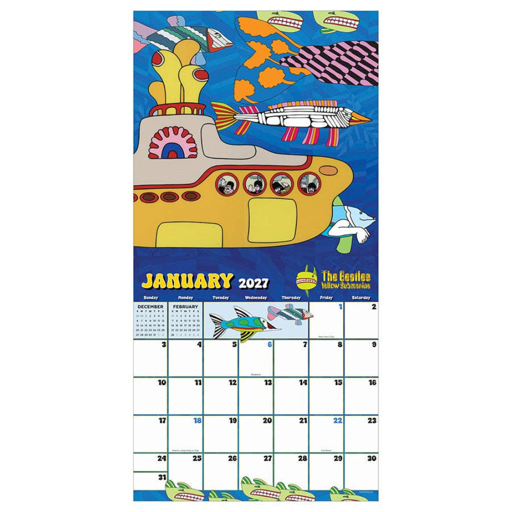 A January 2027 wall calendar page featuring The Beatles 'Yellow Submarine' artwork, with illustrated fish, a yellow submarine, and a monthly calendar grid below on a white background.