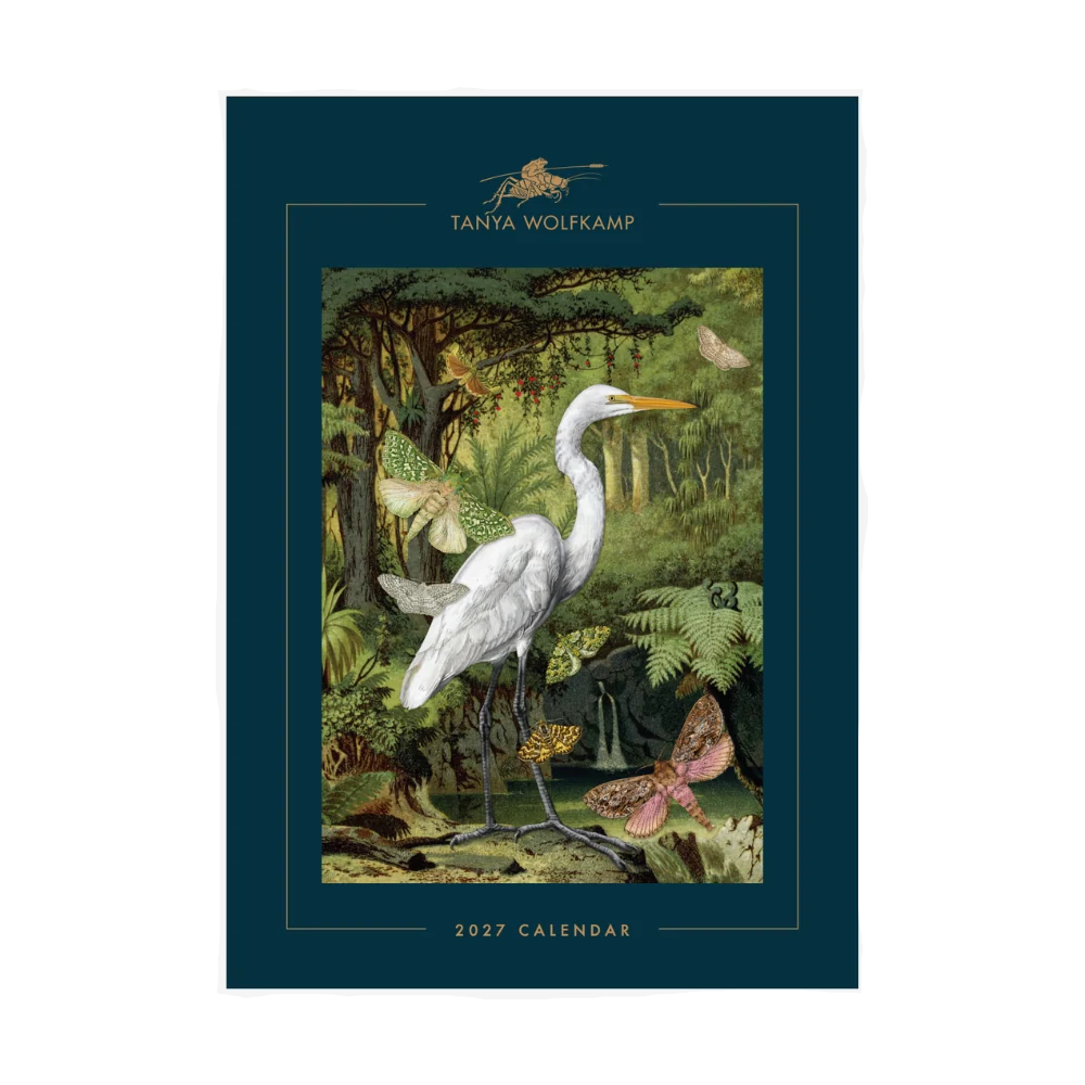 2027 calendar cover with a white heron and fairy illustration on a dark green border