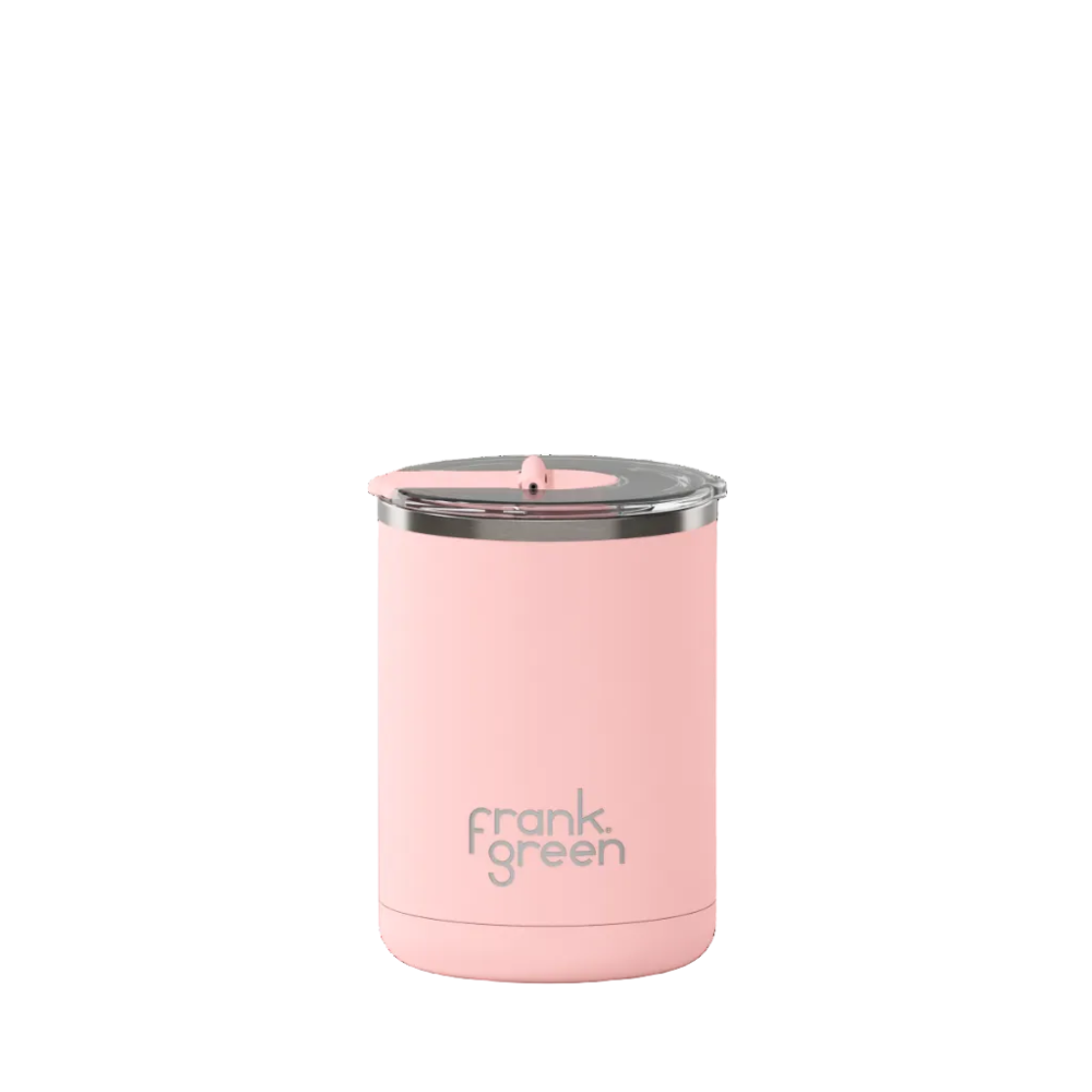 Pink reusable cup with 'frank green' branding on a white background