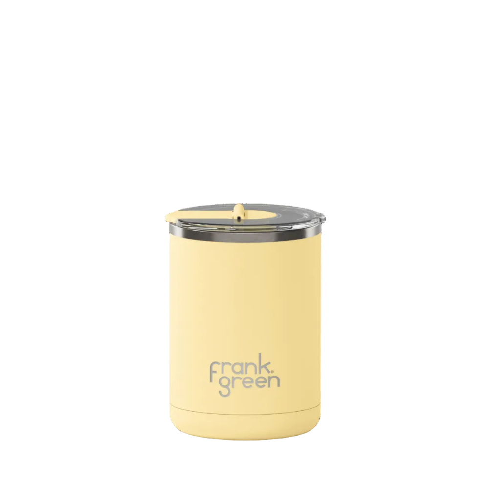 Yellow reusable cup with 'frank green' branding on a white background