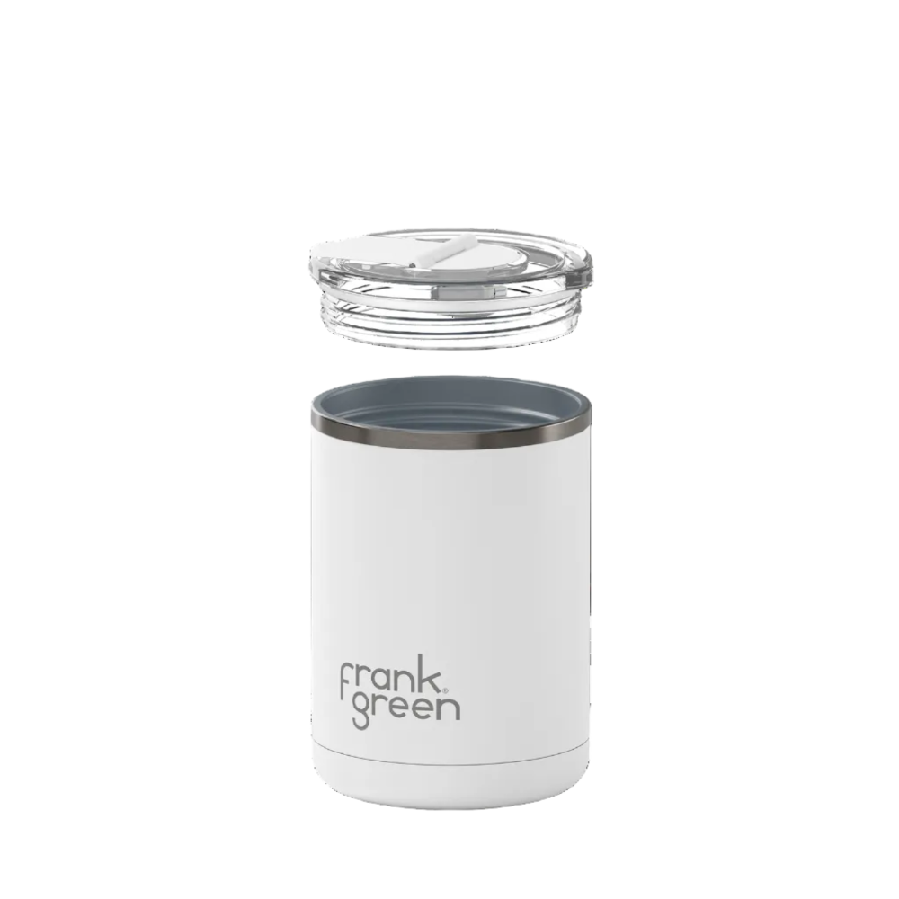 A white vacuum-insulated travel tumbler with a clear lid, shown on a pure white background. The brand name 'frank green' is printed in black on the lower front.