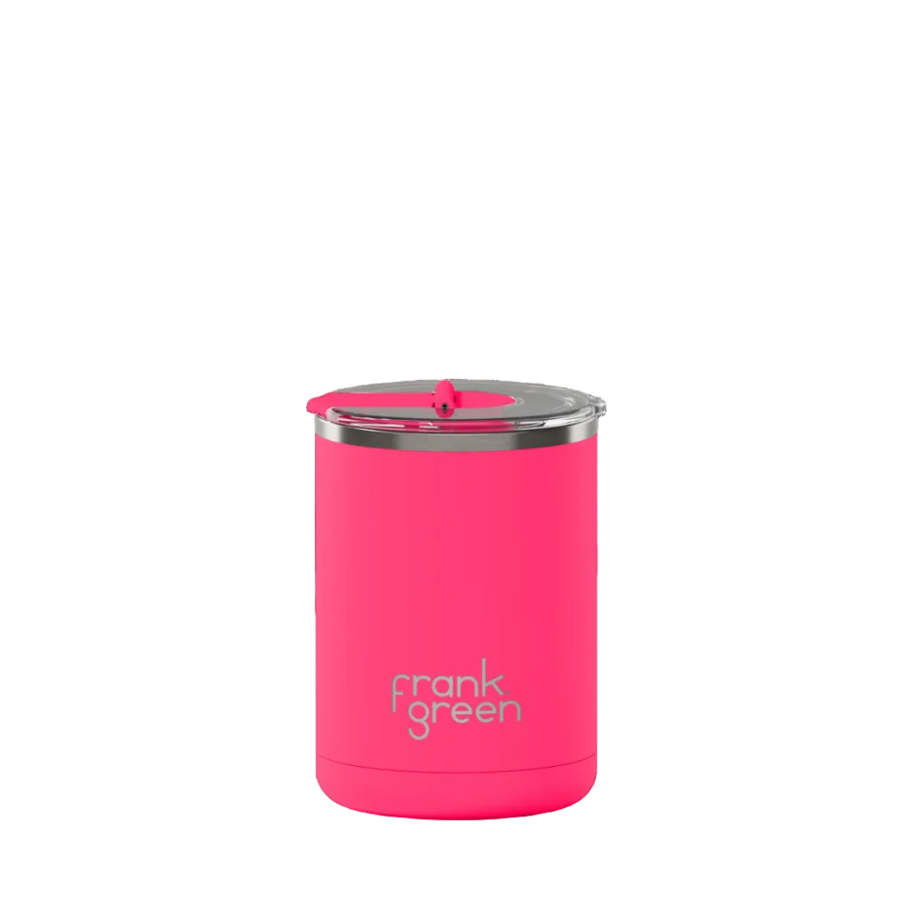 Pink reusable cup with silver lid on a white background, featuring the brand 'frank green'.
