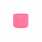 A bright pink silicone cup with the brand name 'frank green' embossed on the front, centered on a solid white background.