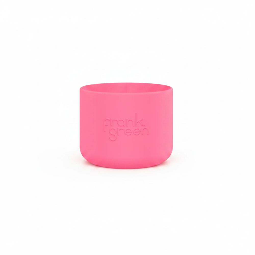 A bright pink silicone cup with the brand name 'frank green' embossed on the front, centered on a solid white background.