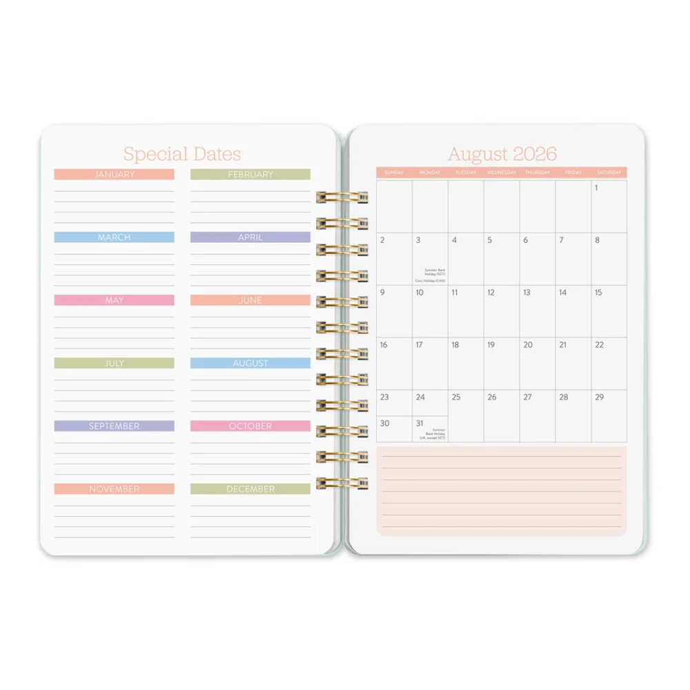 An open spiral-bound planner showing two interior pages: the left page has pastel-colored monthly headers labeled Special Dates, and the right page shows a monthly calendar grid for August 2026 with lined writing space at the bottom. The pages are white with soft pastel accents in pink, peach, blue, green, and lavender, and the spiral binding is metallic gold.