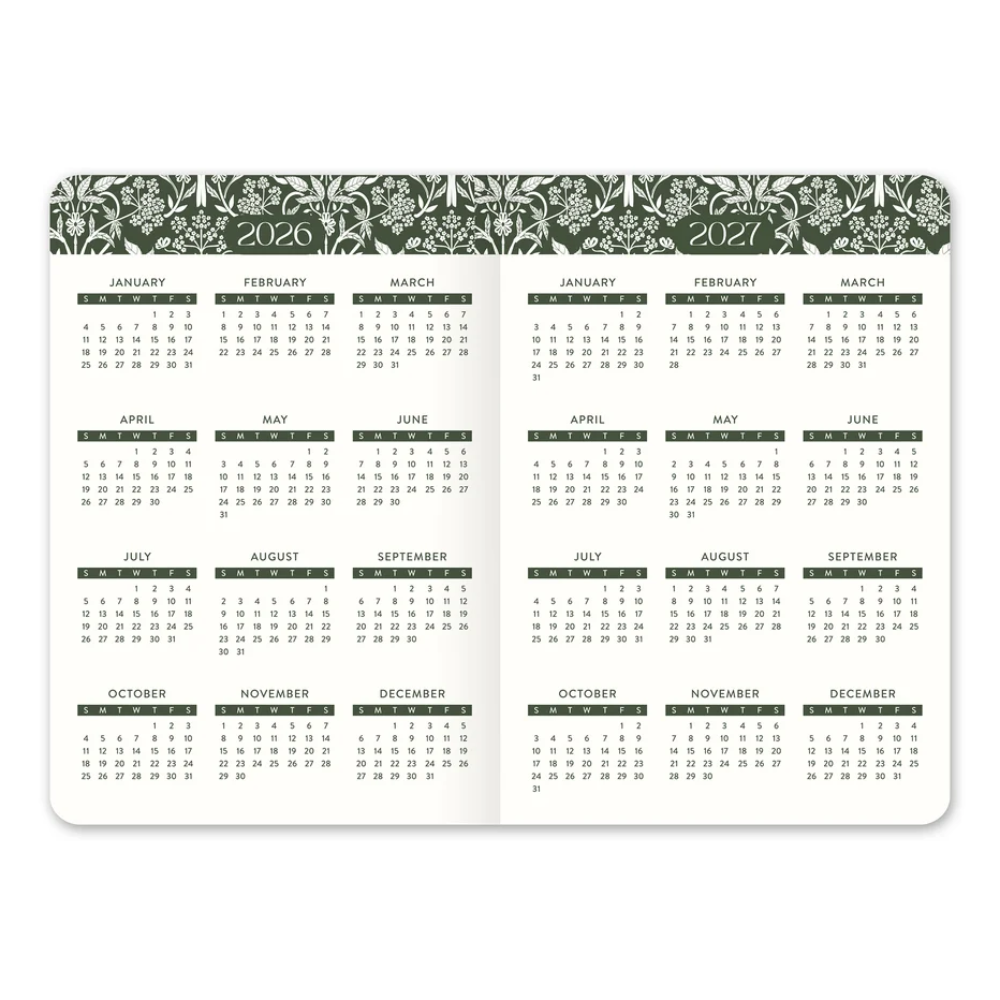 A 12-month calendar spread with a decorative dark green and white floral pattern across the top margin, shown on a plain white background.