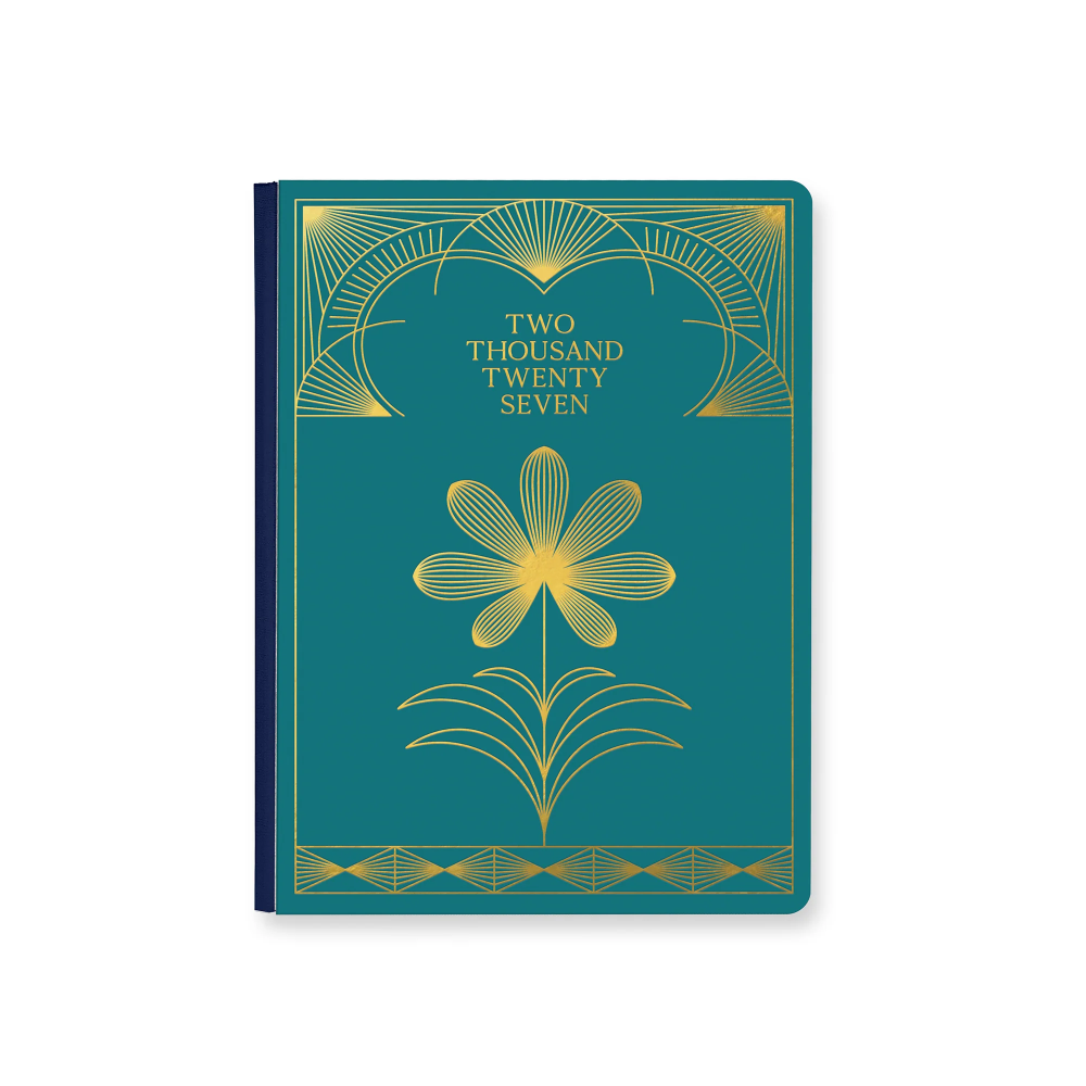 Teal notebook with gold floral design and 'Two Thousand Twenty Seven' text on a white background