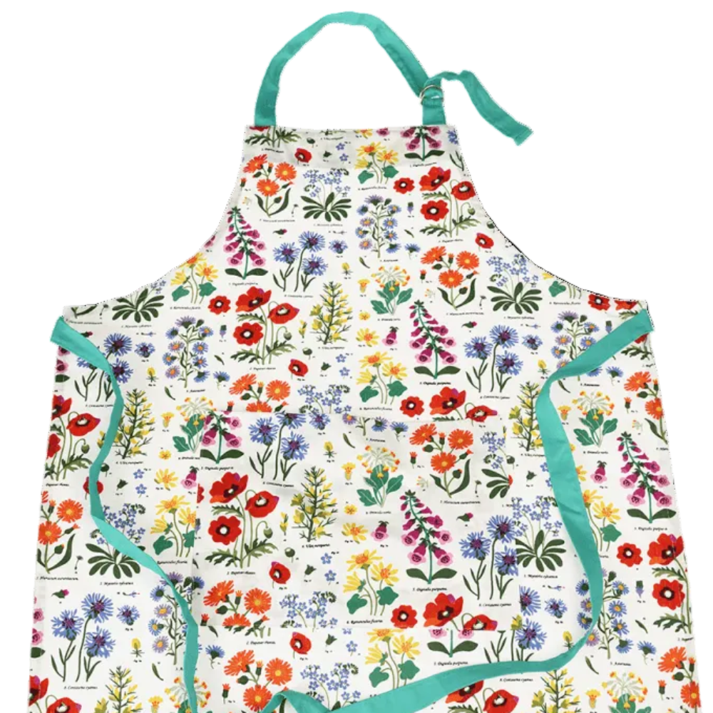 A white bib apron featuring a colorful all-over floral print with green stems and leaves, and teal ties and trim, shown flat against a white background.