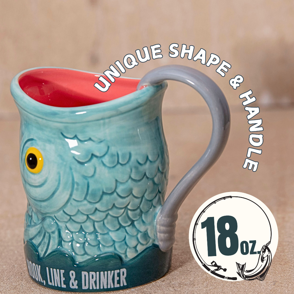 Teal fish-shaped mug with a gray handle on a beige background