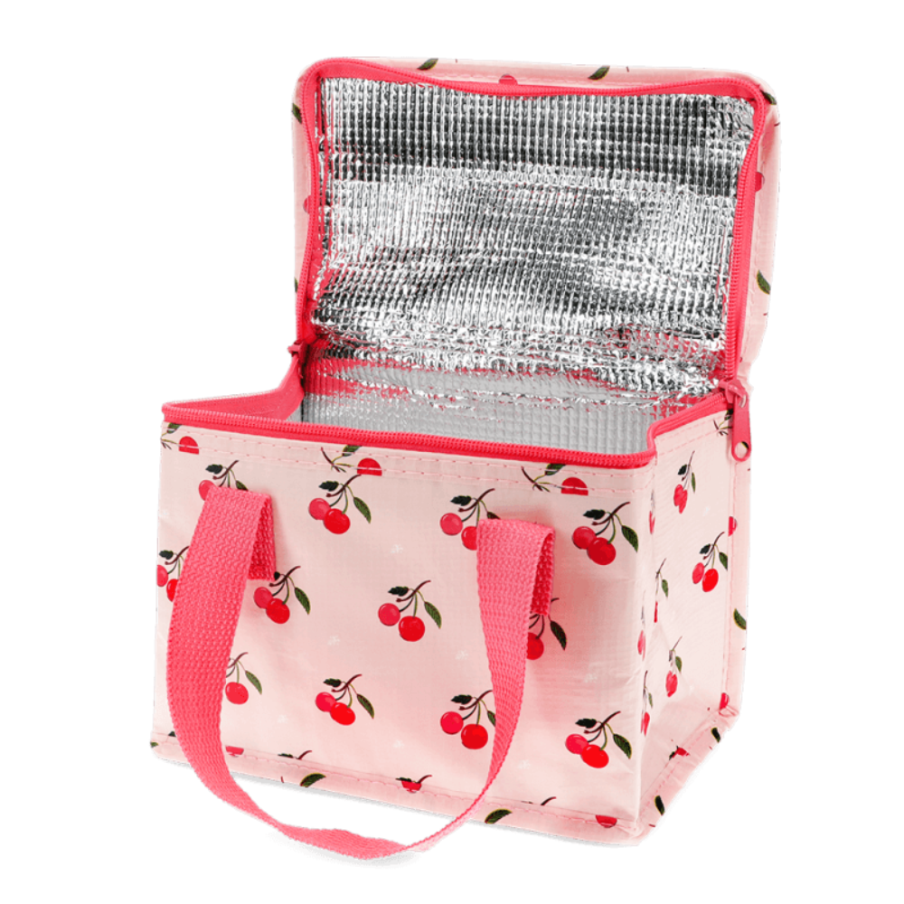 A pink insulated lunch bag with a cherry print pattern, featuring a silver reflective lining and pink handles, shown open on a white background.