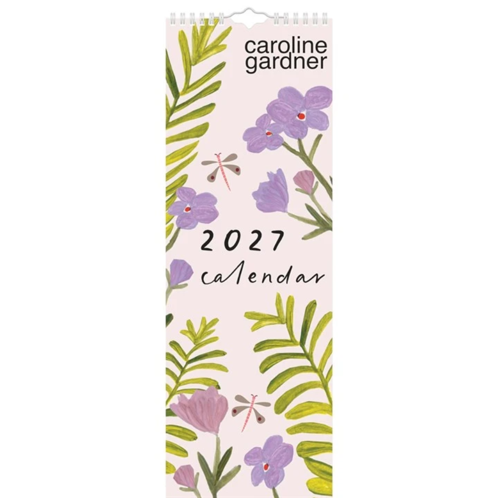 Caroline Gardner 2027 wall calendar featuring a pastel pink cover decorated with watercolor green leaves, purple flowers, and small dragonflies.