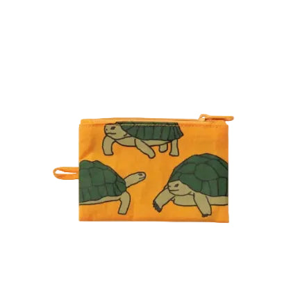 Small pouch with turtle design on a yellow background