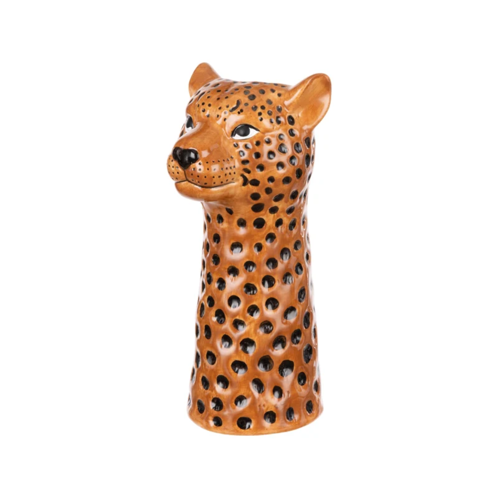 A ceramic salt and pepper shaker designed in the shape of a cheetah head, featuring a glossy brown glaze with black spots, set against a plain white background.