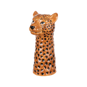 A ceramic salt and pepper shaker designed in the shape of a cheetah head, featuring a glossy brown glaze with black spots, set against a plain white background.