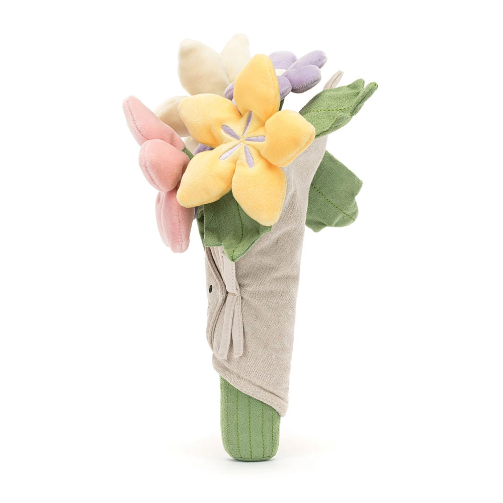 Plush flower bouquet with a green stem on a white background