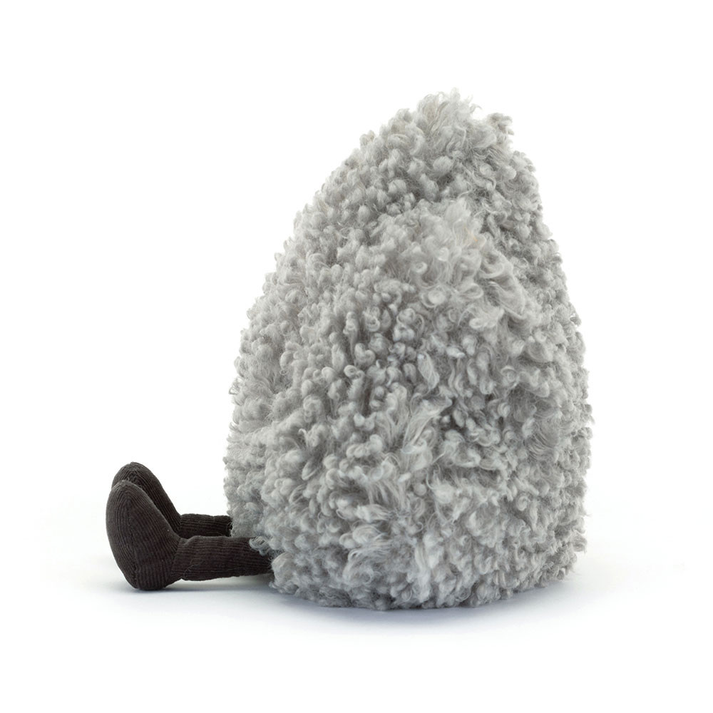 Plush toy resembling a tree with a soft texture on a white background