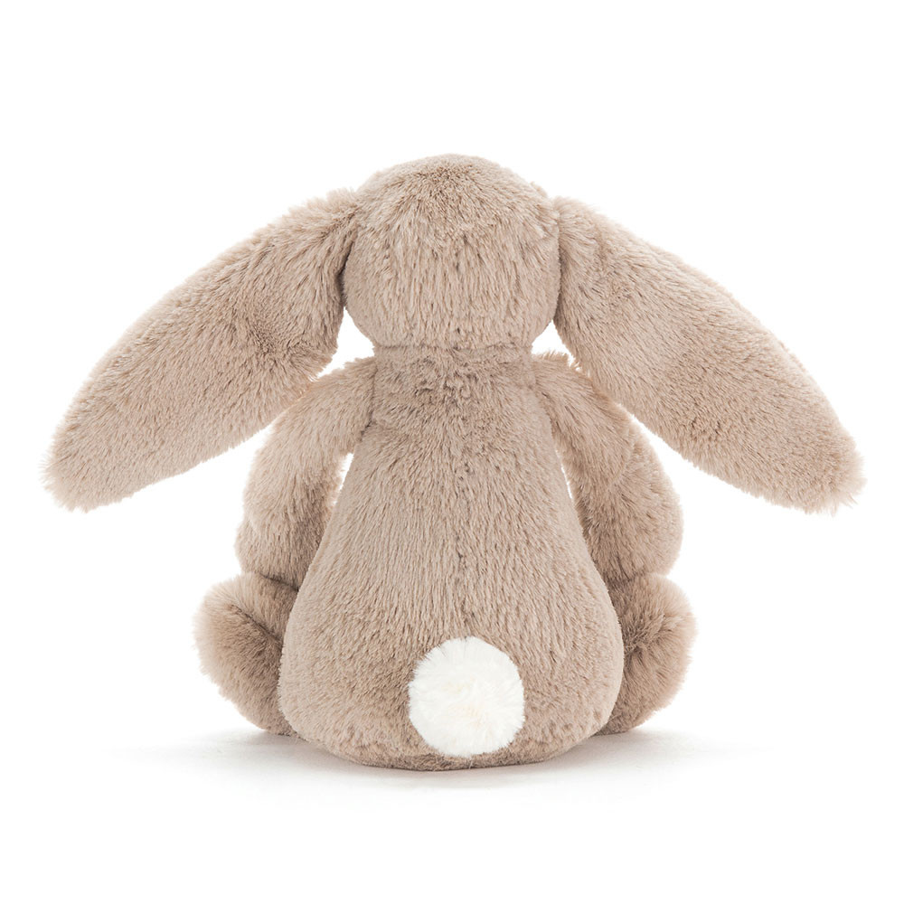 Plush bunny toy with a white belly on a white background