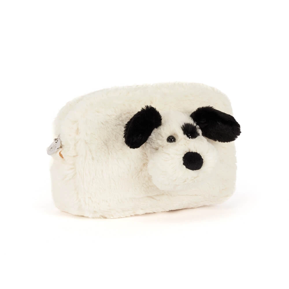 A white faux fur cosmetic pouch shaped like a dog's head, featuring black ears, nose, and eyes, on a solid white background.