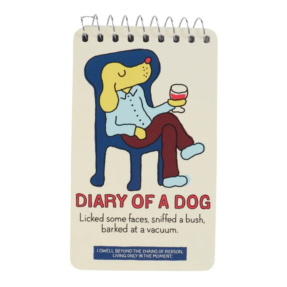 Notebook with a cartoon dog design and humorous text on the cover