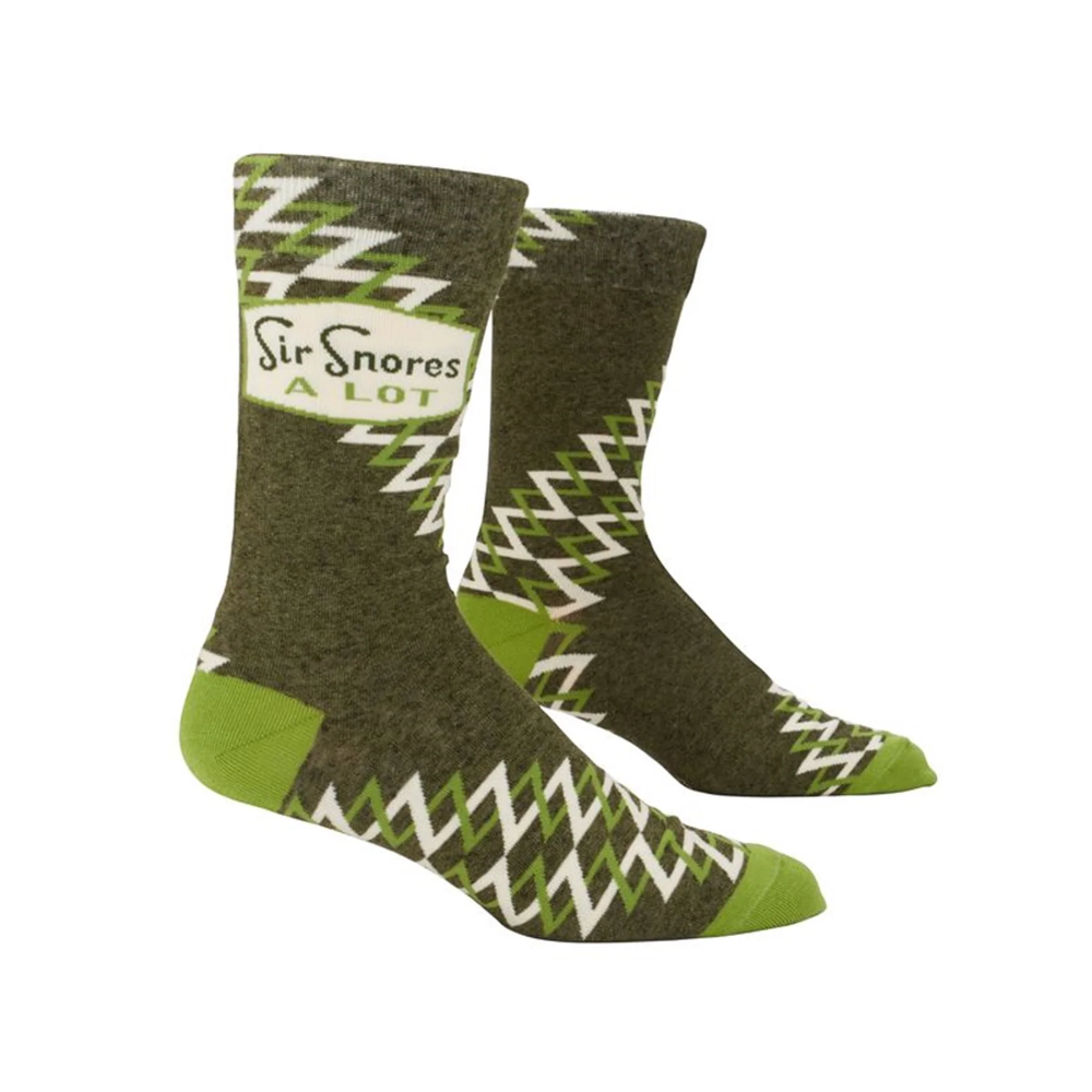 Pair of green and gray socks with zigzag pattern and 'Sir Snores a Lot' text on a light gray background