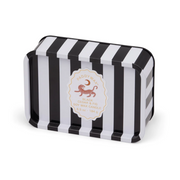 Black and white striped candle tin with a brand logo on a white background
