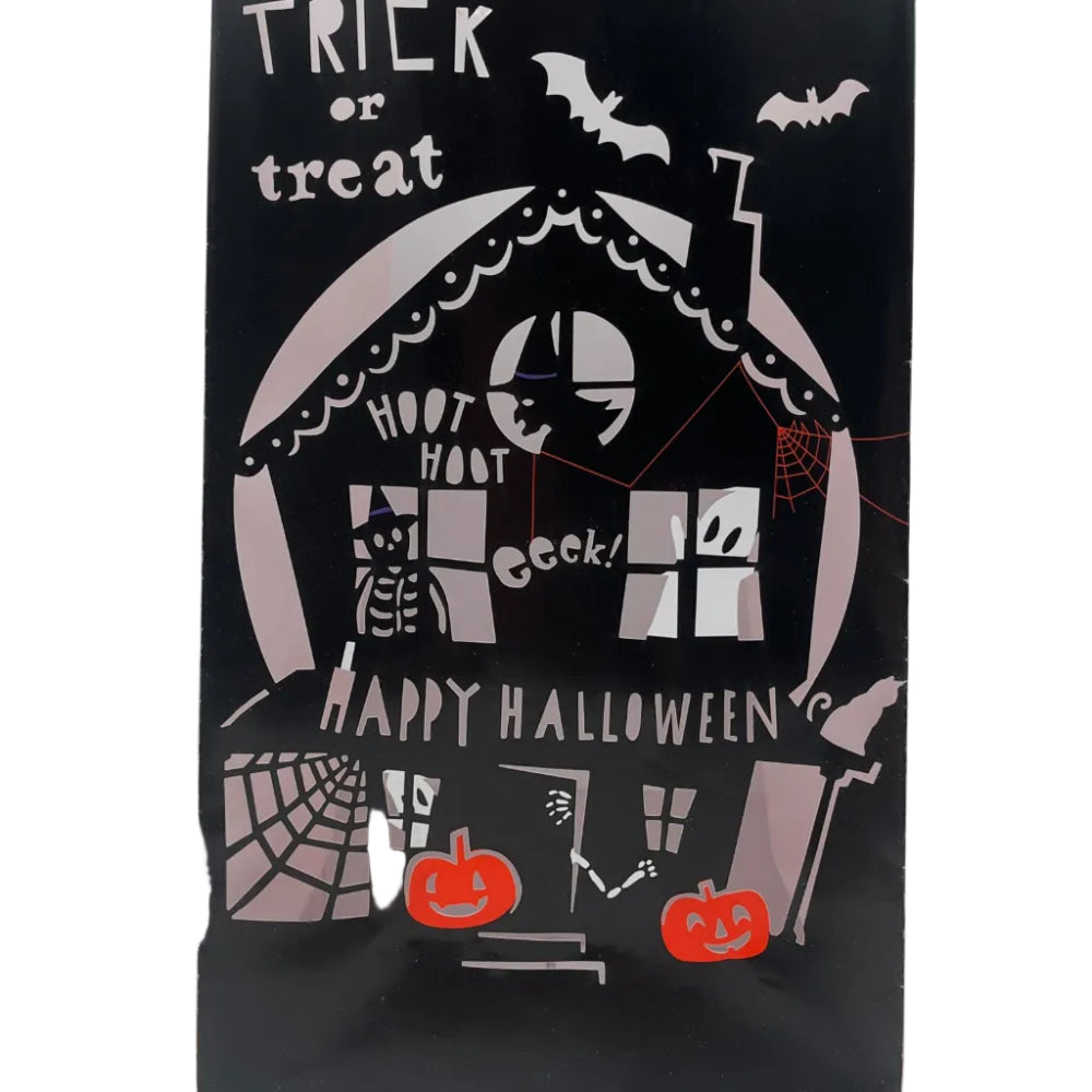 A black Halloween treat bag with a red scalloped top edge, featuring a white haunted house illustration, bats, spiderwebs, and orange jack-o'-lanterns. The text 'TRICK or treat' appears at the top and 'Happy Halloween?' at the bottom, set against a plain light gray background.