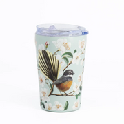 A light blue insulated tumbler with a clear lid, decorated with a detailed illustration of a brown and gray bird perched on a branch with white flowers and green leaves.