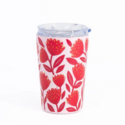 A tall travel tumbler with a clear plastic lid, decorated with a red floral pattern on a white background.
