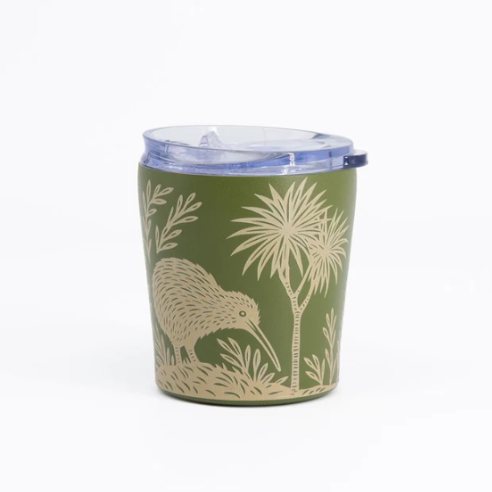 An olive green insulated tumbler with a clear lid, decorated with a beige kiwi bird and palm tree design, on a white background.