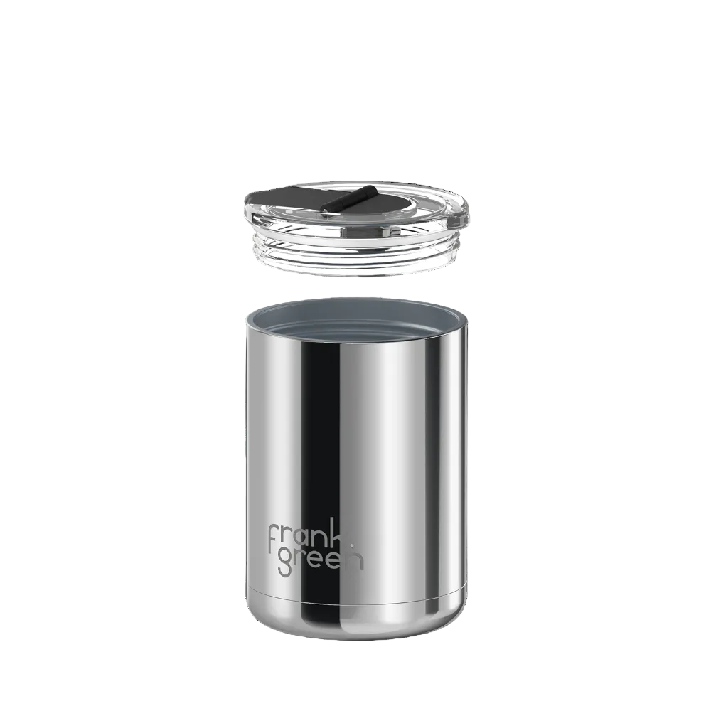 A stainless steel travel tumbler with a clear lid and dark gray interior, shown on a plain white background. The brand name 'frank green' is printed on the lower front.