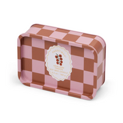 Checkered tin box with a label on a white background