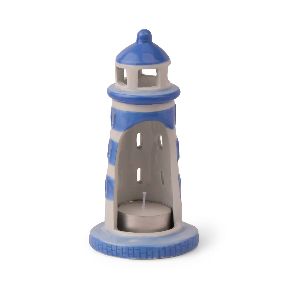 Decorative lighthouse-shaped candle holder with blue and white design on a white background
