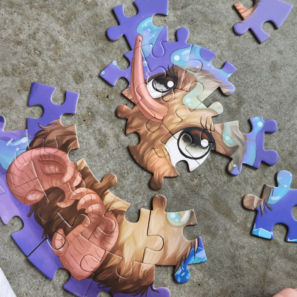 Kuwi the Kiwi Glowworm Glitter Round 100 Piece Puzzle