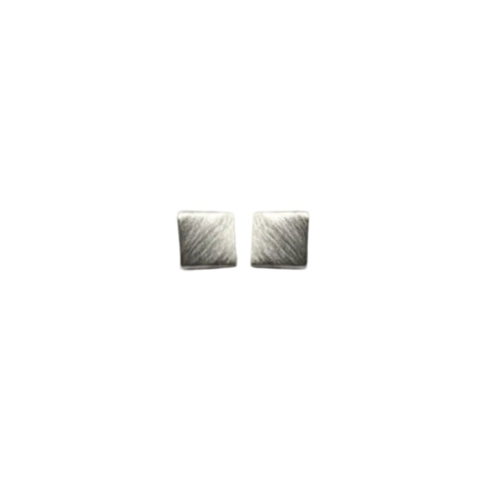 A pair of small square silver stud earrings with a textured, hammered surface, displayed on a plain light gray background.