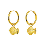 A pair of gold hoop earrings with dangling fish charms, shown on a plain white background.