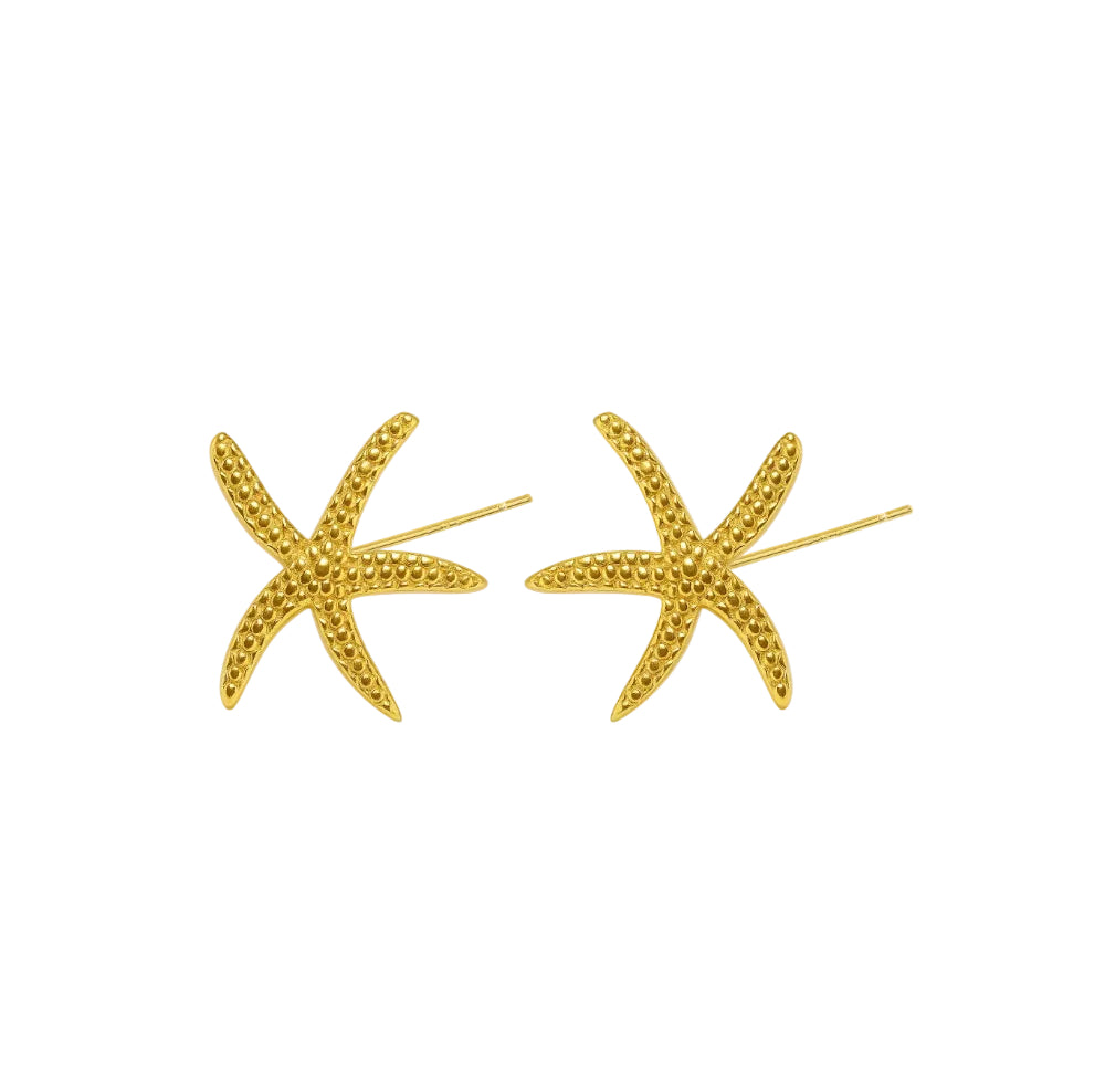 A pair of gold starfish stud earrings with a textured, beaded surface, shown on a plain white background.