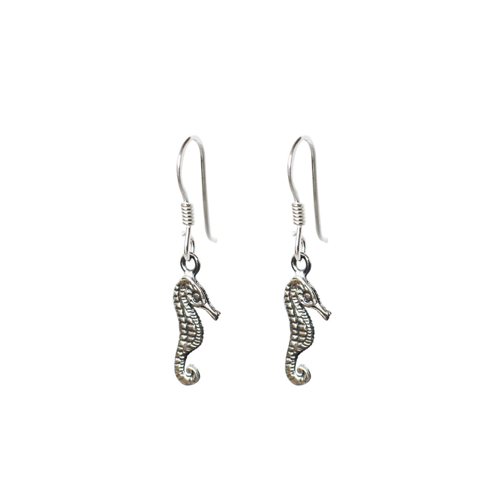 Dangly silver seahorse charm earrings.