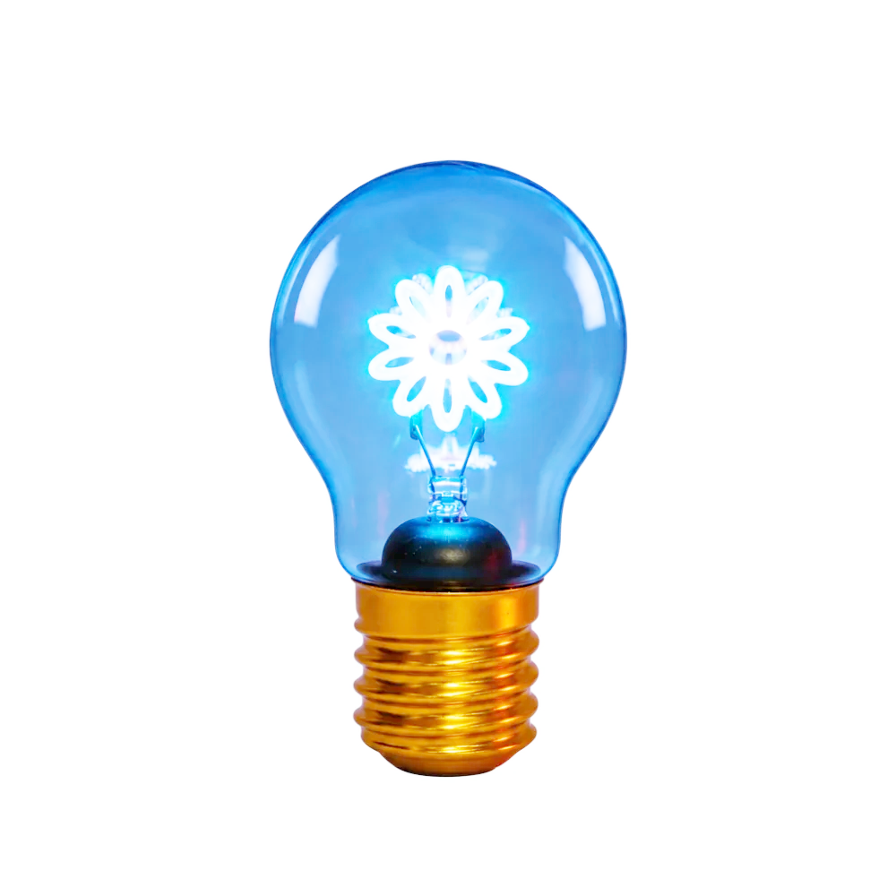 A hand is holding a clear glass light bulb with a glowing white flower-shaped bulb inside and a gold screw base, set against a dark gray background.