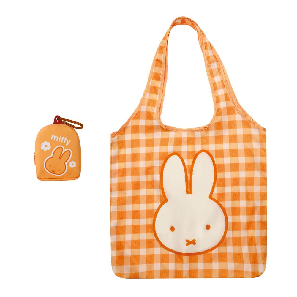 Orange checkered tote bag with a rabbit design and a smaller matching pouch on a white background