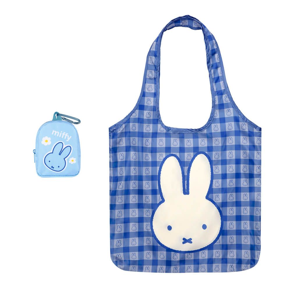 Blue checkered tote bag with a white bunny face design and a small blue pouch with a bunny face on a white background.