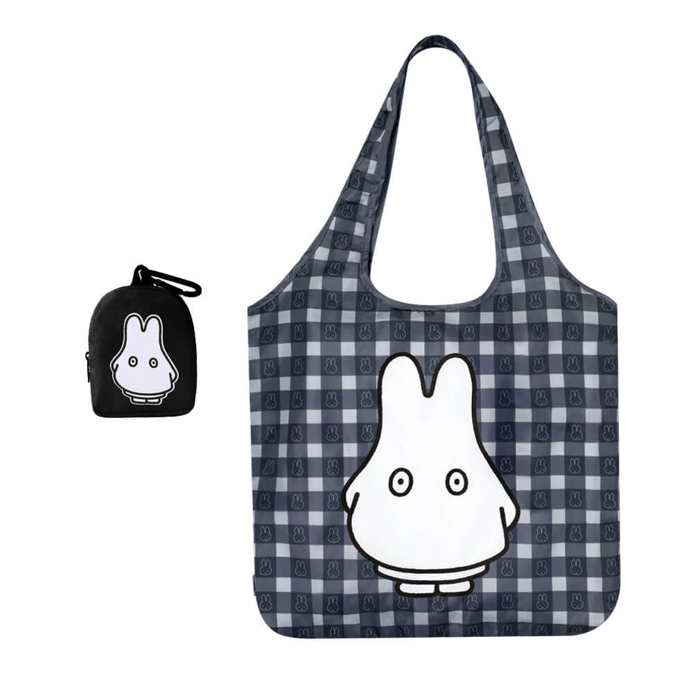 Checkered tote bag with cartoon character design on a white background
