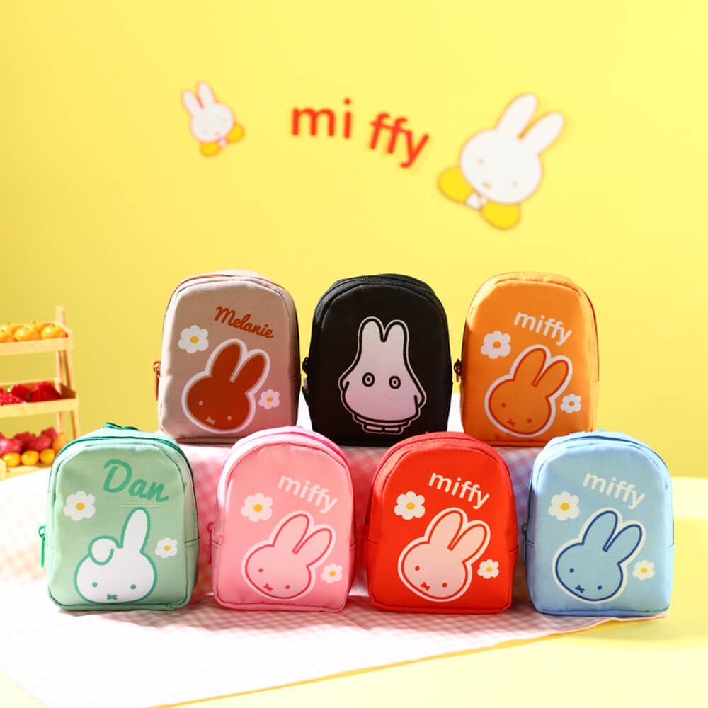 Set of small pouches with Miffy design on a yellow background